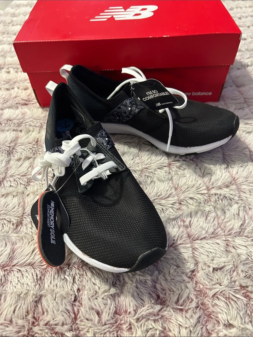 New Balance Black & White women’s Athletic Sneakers size 7